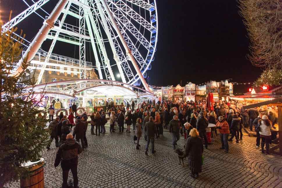 Ferris wheel with crowds
