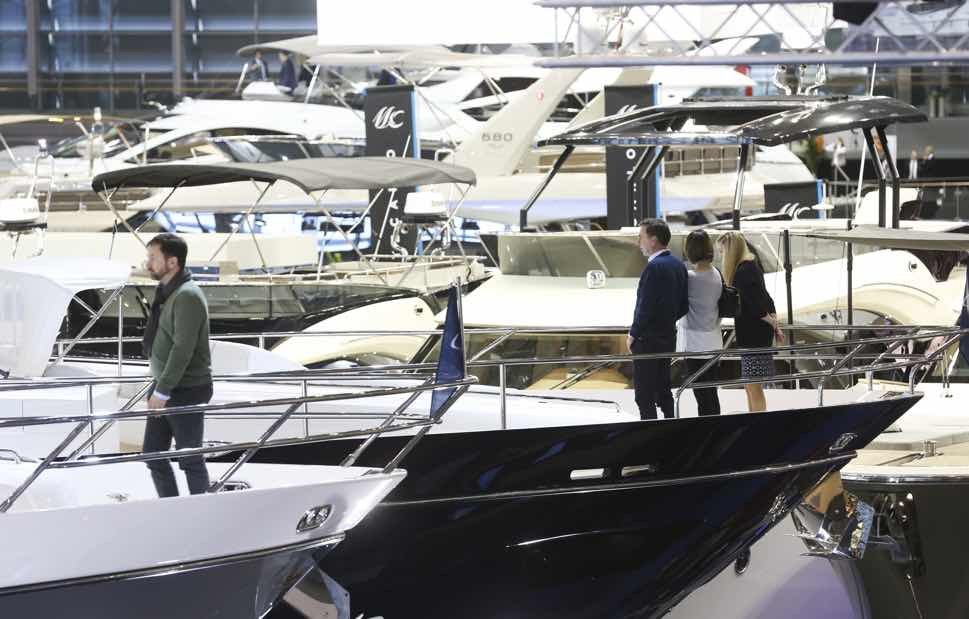 Multiple boats in trade fair hall