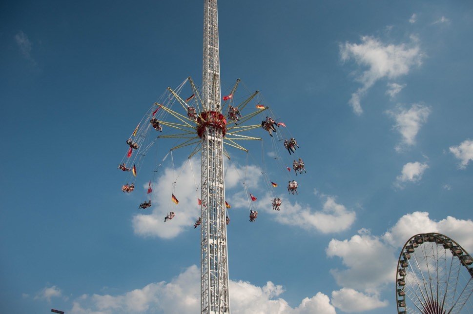 Funfair ride against blue sky