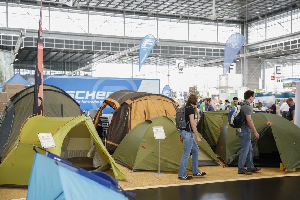 Multiple tents in trade fair hall