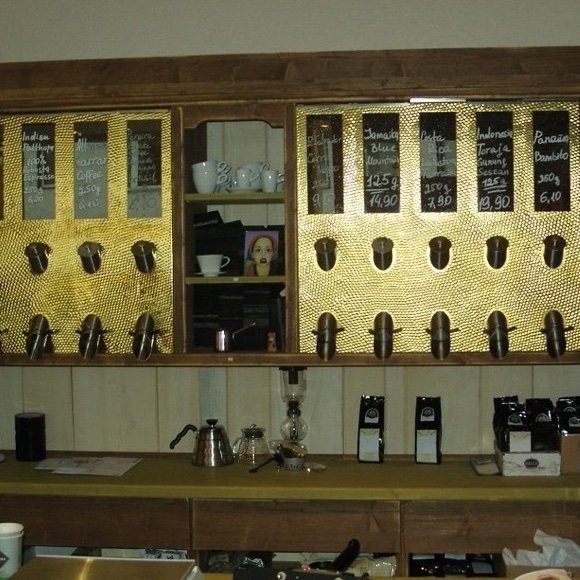 Coffee dispensers on cafe wall