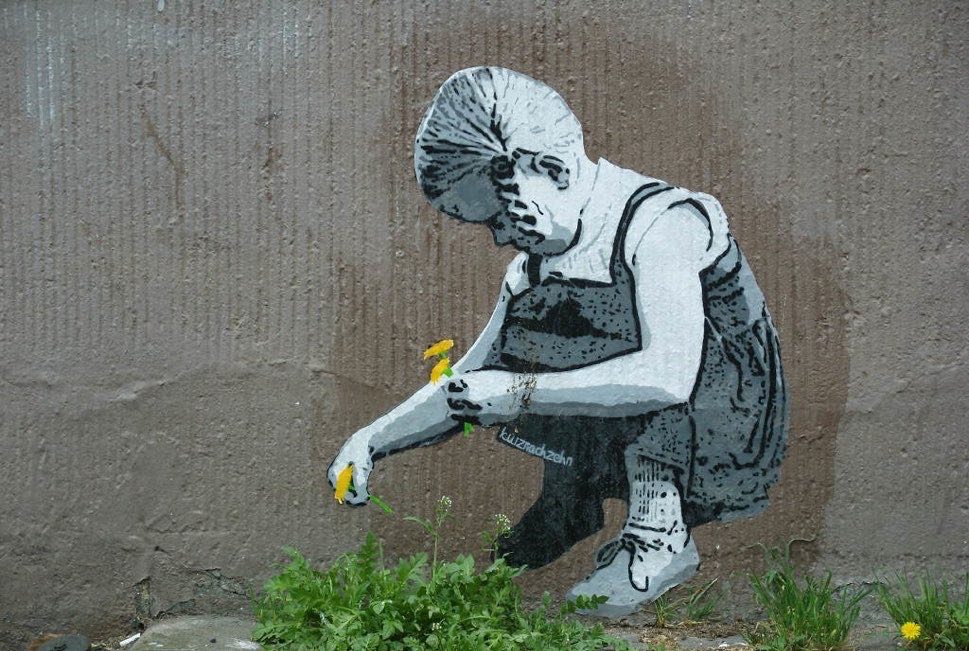 Street art of girl crouching