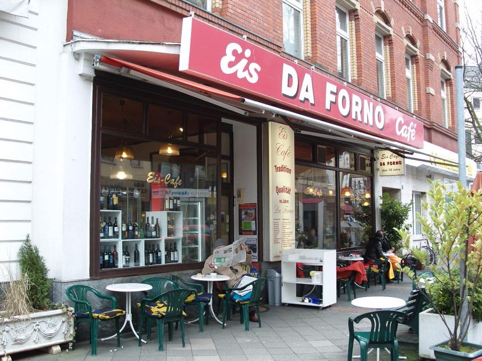 Ice cream store frontage with tables and chairs