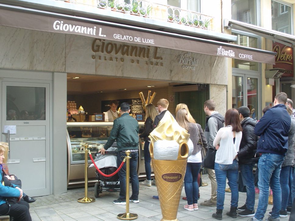 Ice cream store frontage with queue