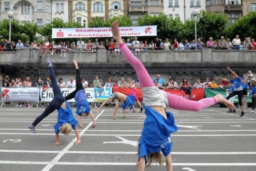 Children performing cartwheels