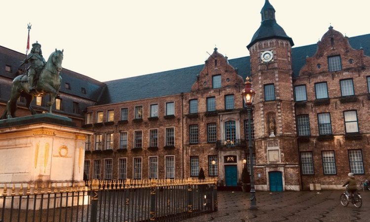 The old city hall in winter twilight