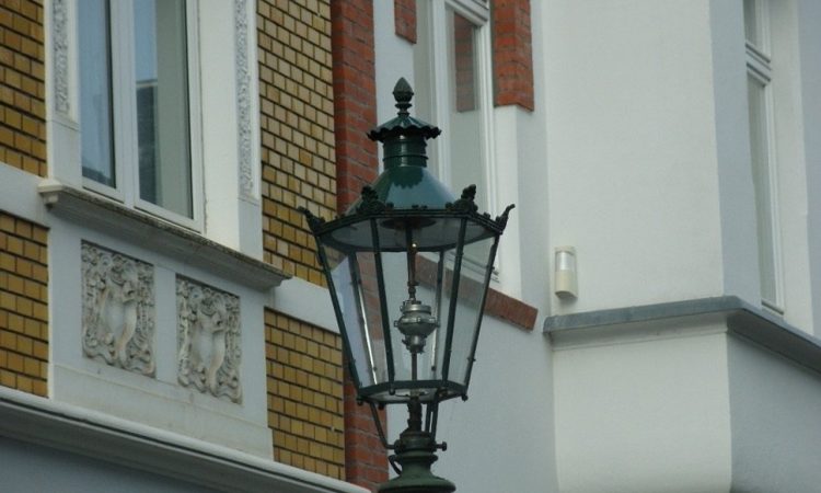 Gas lantern in front of building