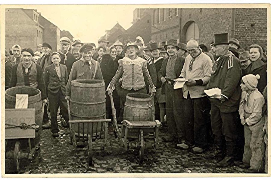 Sepia photo of wheelbarrow race