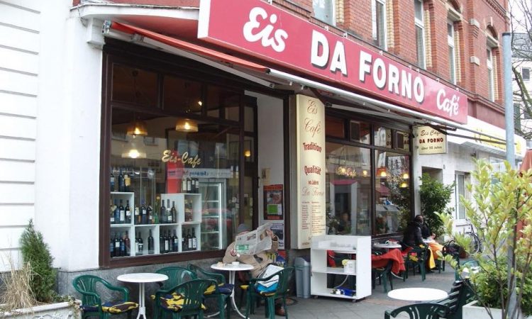 Ice cream store frontage with tables and chairs